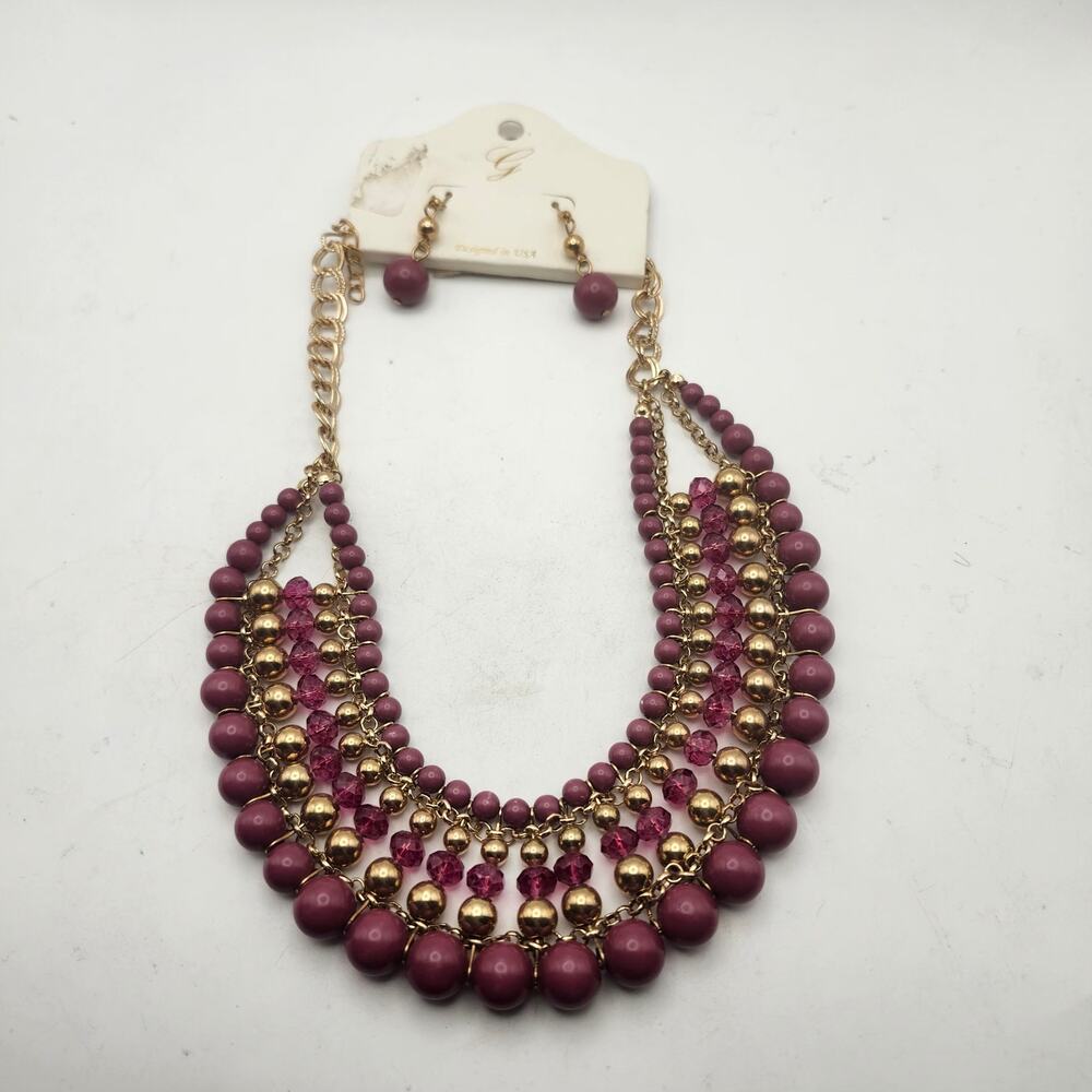 Glik's Burgundy Glass Bead Gold Tone Layered Bib Necklace Earrings Set Carded